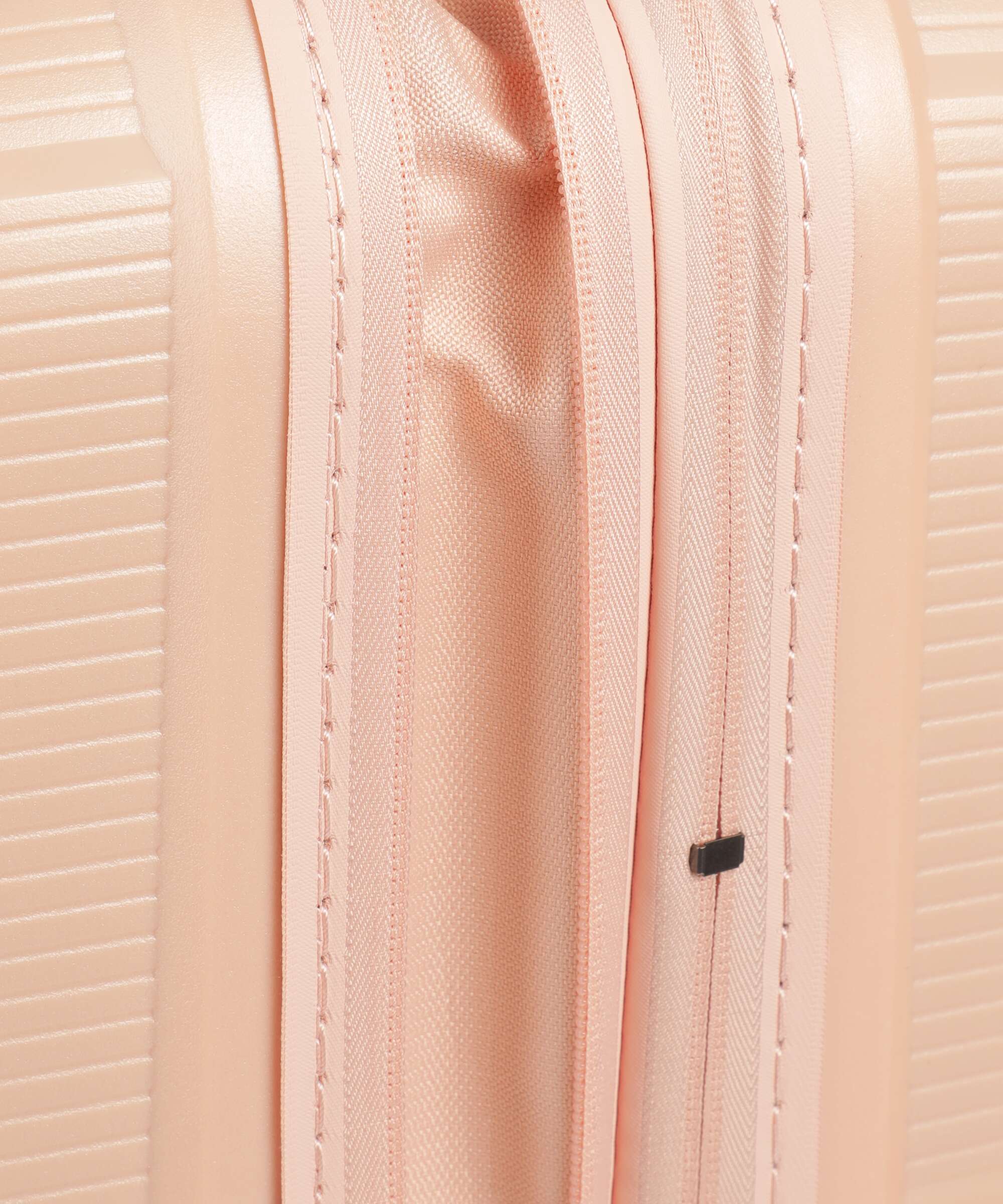 American Tourister Starvibe Spinner (4 wheels) metallic peach