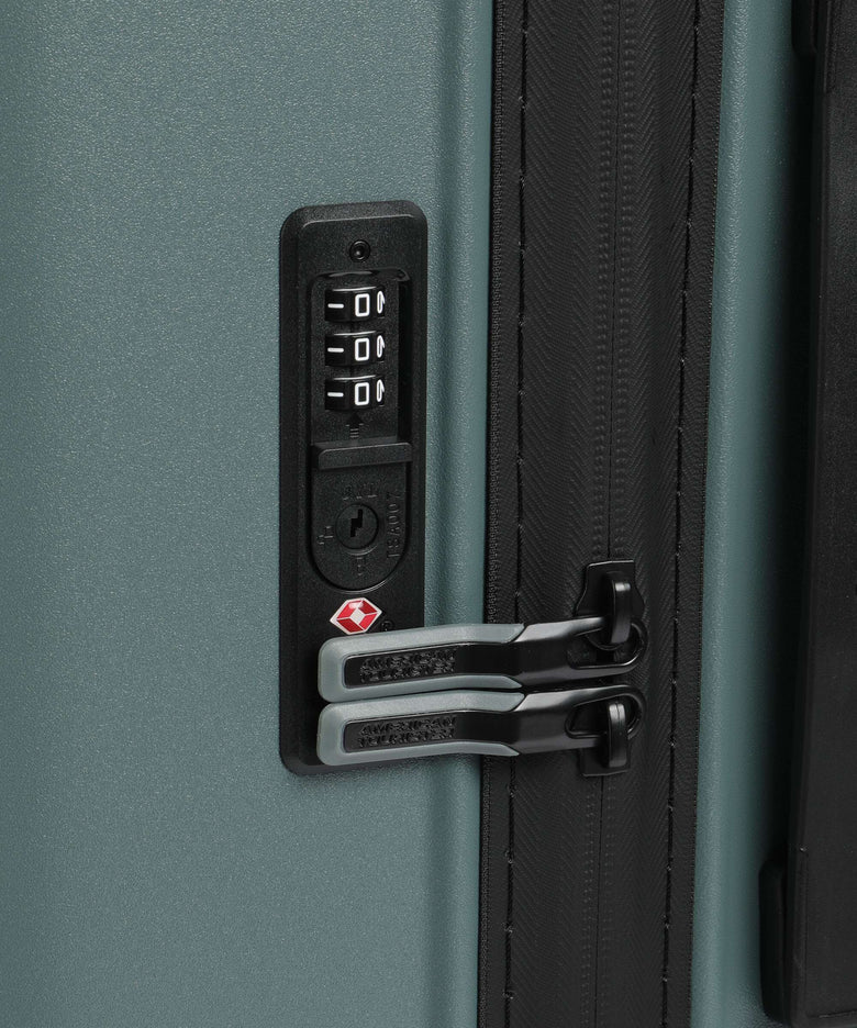 American Tourister Trailon Spinner (4 wheels) dark forest